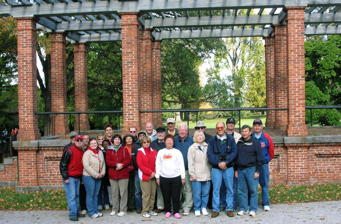 Tour attendees stop for a group picture at the Rostrum inside the Soldiers’ National Cemetery at Gettysburg National Military Park. (Image Courtesy Jerry Arnsberger)